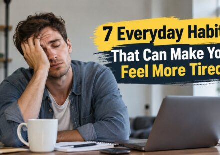 Everyday habits that can make you feel more tired, shown by an exhausted man working at a desk.